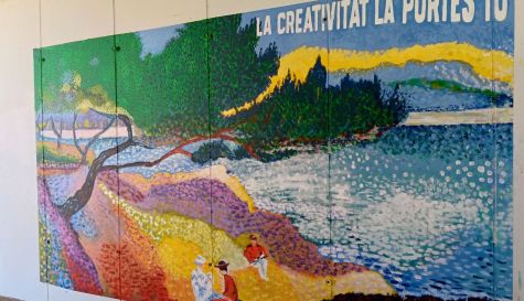 Mural del proyecto Piedra y Amapola en un colegio de Alcàsser