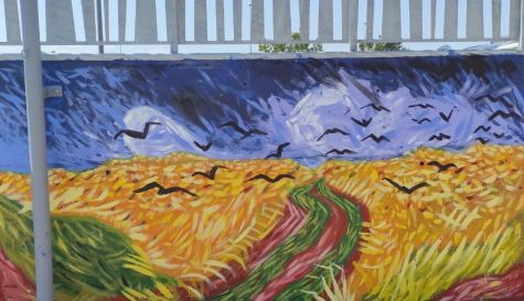 Mural del proyecto Piedra y Amapola en un colegio de Alcàsser
