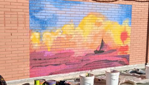 Mural del proyecto Piedra y Amapola en un colegio de Alcàsser