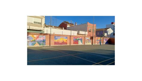 Mural del proyecto Piedra y Amapola en un colegio de Alcàsser