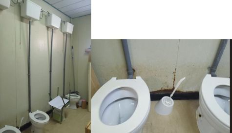 Banys de les aules prefabricades amb les parets oxidades. Banys de les aules prefabricades amb les parets oxidades.