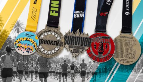 Distintos modelos de medallas de finisher de carreras populares celebradas en Valencia, como la Volta a Peu, la Unbroken Race, el Festival Infinitri o el 21K Valencia Trinidad Alfonso.