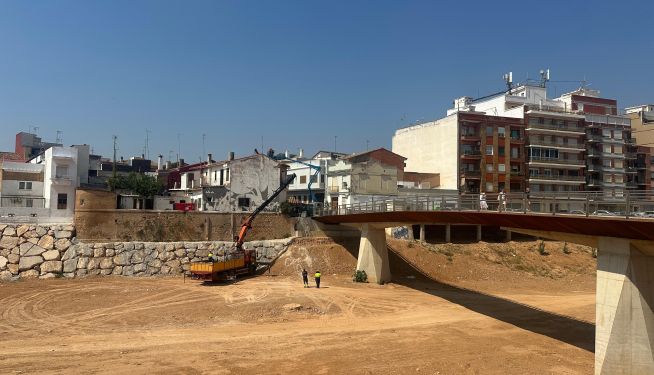 Treballs de reconstrucció en el barranc del Poio al seu pas per Paiporta a 28 de juliol de 2026.