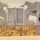 Una fachada con humedades y desconchados, un problema habitual en las viviendas con la llegada del otoño. / Jan Van Der Wolf