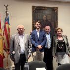 Representantes y participantes durante un acto celebrado en Valencia.